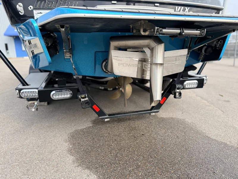 Slide: The Image of Rear view of a 2016 Malibu Wakesetter 22 VLX boat. - 18