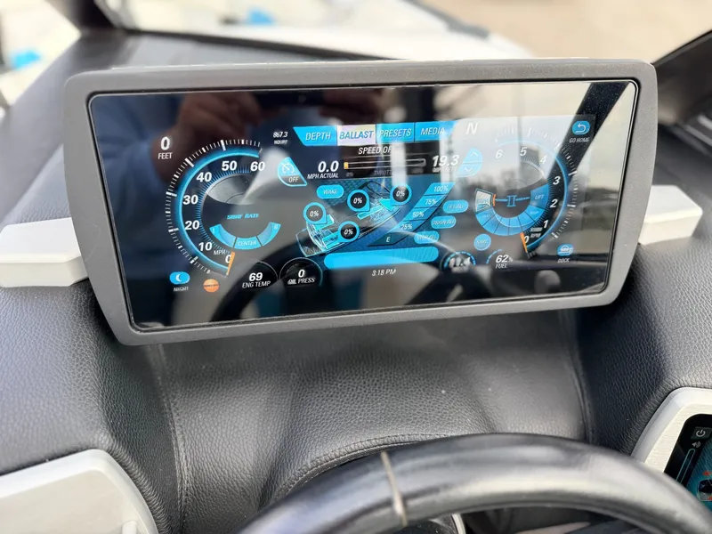 Slide: The Image of 2016 Malibu Wakesetter 22 VLX dashboard with digital display. - 6