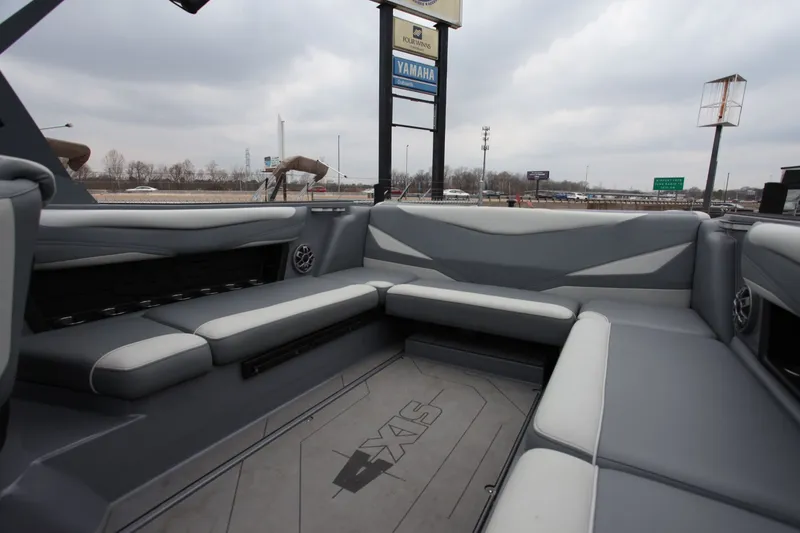 Slide: The Image of Interior of a 2021 Axis T23 boat with gray upholstery. - 5