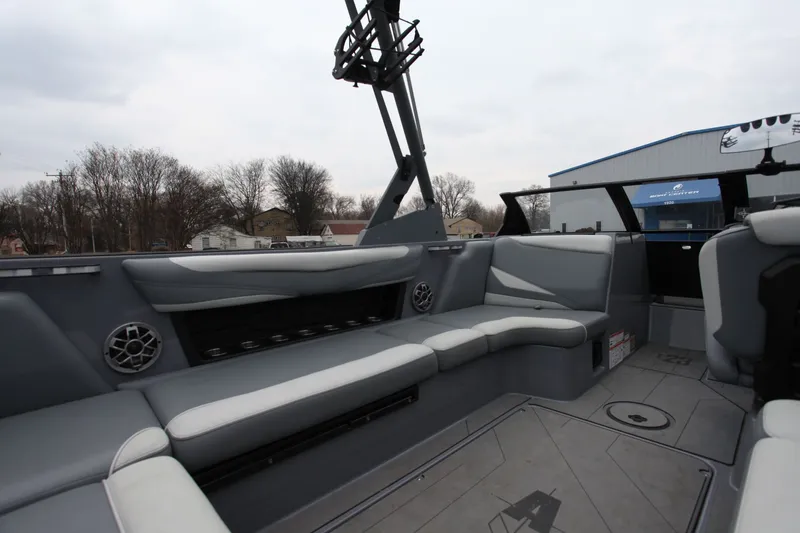 Slide: The Image of Interior of Axis T23 boat, gray upholstery, speakers, 2021 model. - 6