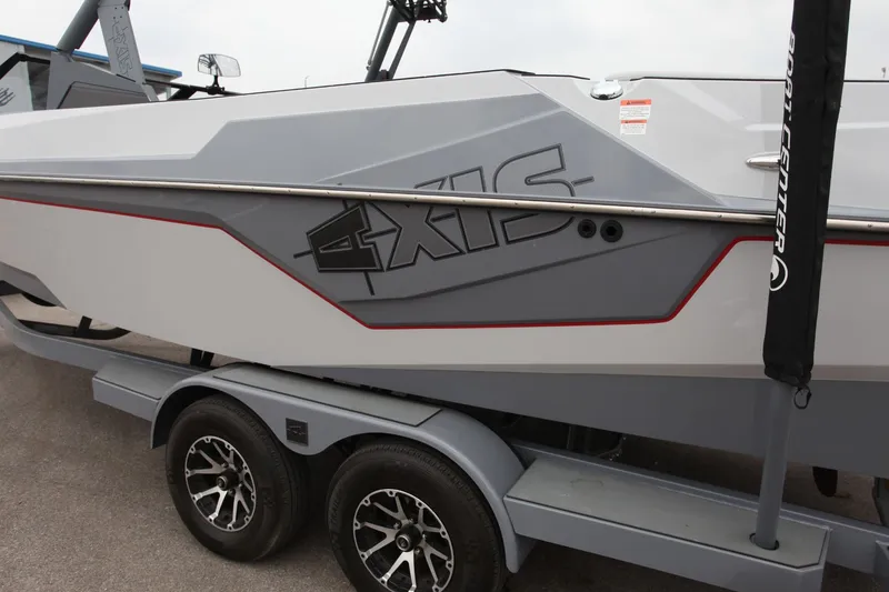 Slide: The Image of 2021 Axis T23 boat on trailer, side view. - 9