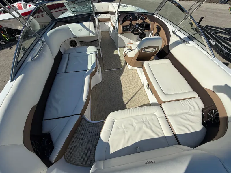 Slide: The Image of Interior of a 2015 Cobalt 220S boat with white seating. - 15