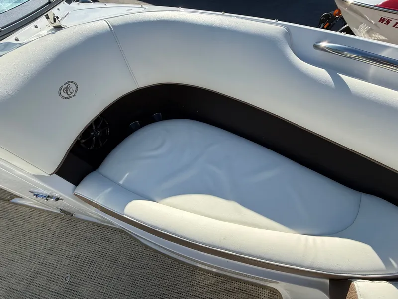 Slide: The Image of Interior of a 2015 Cobalt 220S boat with white seating. - 27