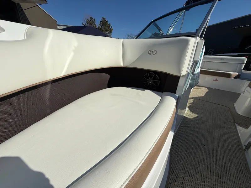 Slide: The Image of Interior of a 2015 Cobalt 220S boat with white seating. - 29