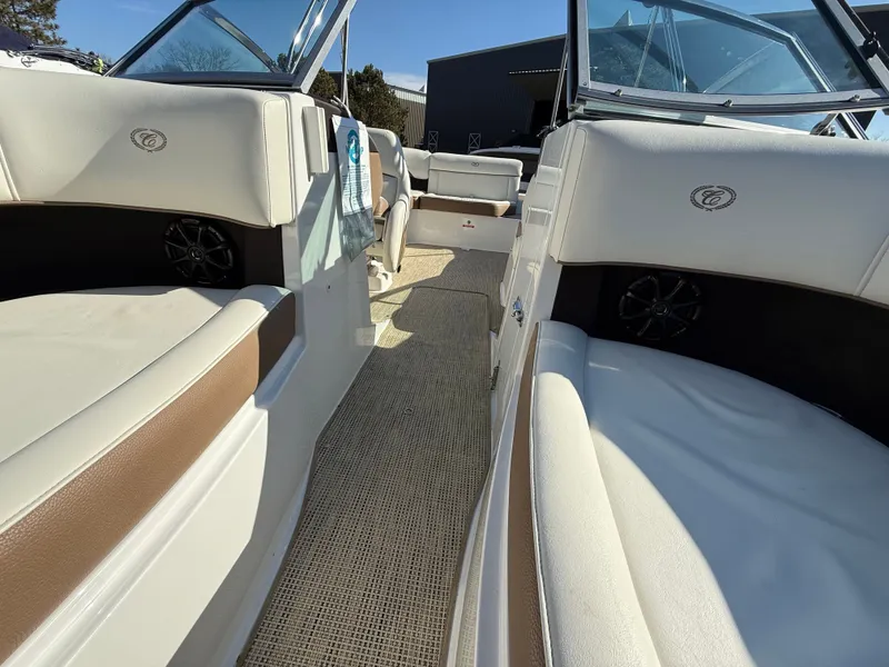 Slide: The Image of Interior of a 2015 Cobalt 220S boat with beige seating. - 30