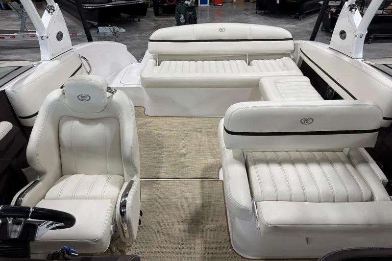 Slide: The Image of Luxurious interior of a 2015 Cobalt R5 boat with white leather seating. - 11