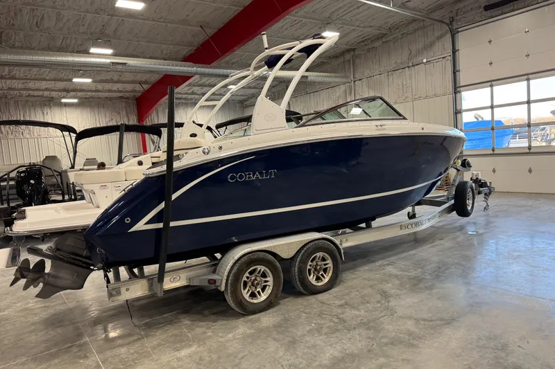 Slide: The Image of 2015 Cobalt R5 boat on trailer in indoor storage facility. - 2