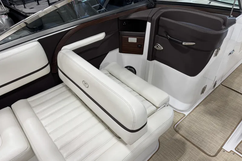 Slide: The Image of Luxurious interior of a 2015 Cobalt R5 boat with white leather seating. - 9