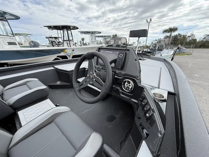 Slide: The Image of Interior of Xpress Hyper-Lift Bass Series H20 boat, 2026 model. - 12