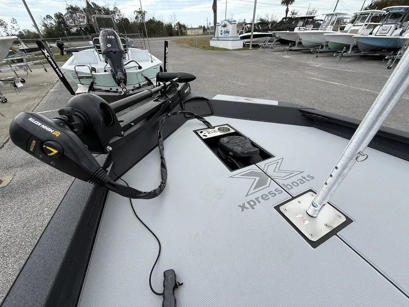 Slide: The Image of Xpress Hyper-Lift Bass Series H20 boat, 2026 model, with Minn Kota motor. - 8