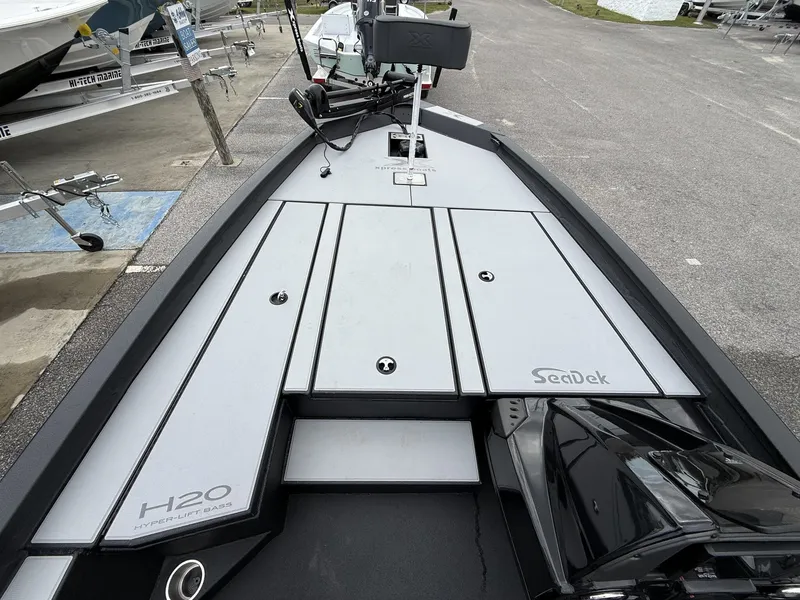 Slide: The Image of 2026 Xpress Hyper-Lift Bass H20 boat deck with SeaDek coating. - 9