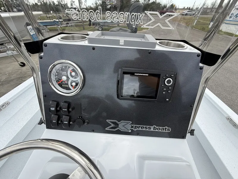 Slide: The Image of Dashboard of Xpress H20B Bay boat, model year 2026. - 14