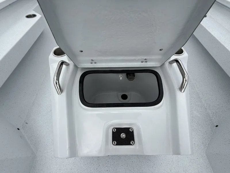 Slide: The Image of Open storage compartment in Xpress H20B Bay boat, 2026 model. - 8