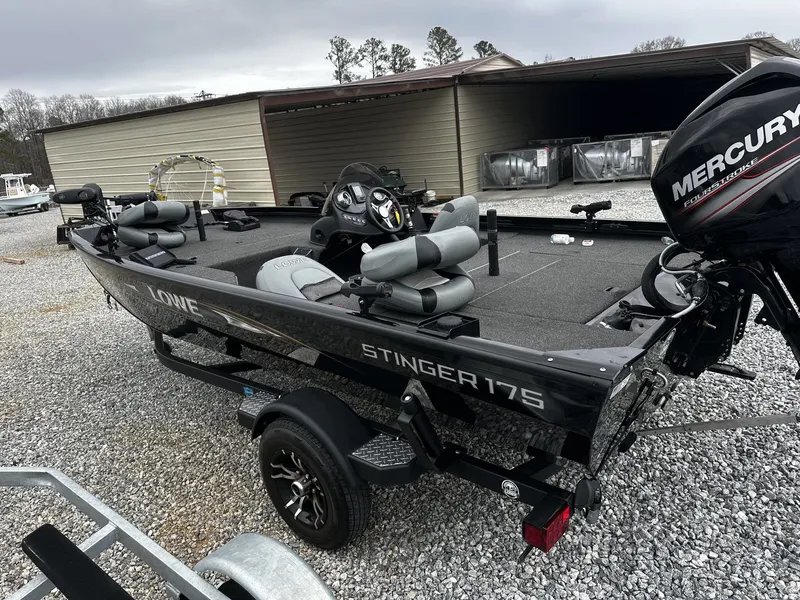 Slide: The Image of 2016 Lowe Stinger ST175 boat with Mercury engine on gravel lot. - 3