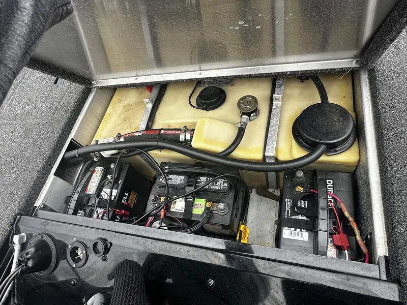 Slide: The Image of Battery compartment of a 2016 Lowe Stinger ST175 boat with addons. - 8