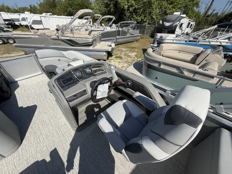 Slide: The Image of 2026 Avalon LSZ 25 Quad Lounger-Tritoon interior with helm console. - 9