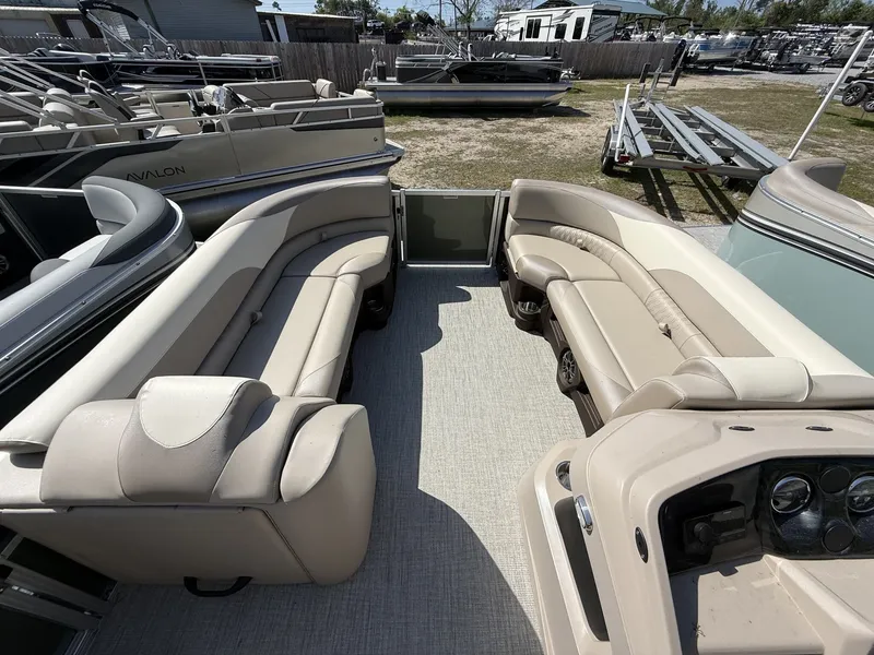 Slide: The Image of Interior of Avalon LSZ 25 QUAD LOUNGER-TRITOON 2026 with beige seating. - 4