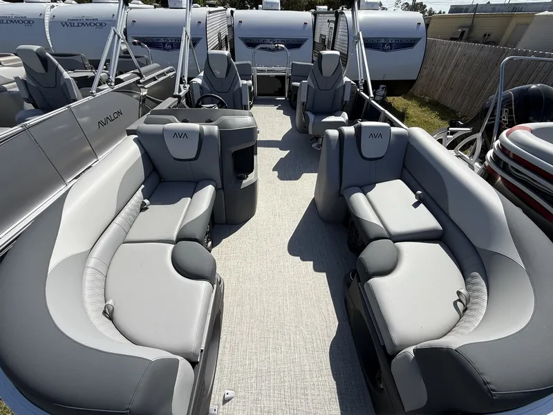 Slide: The Image of Interior of 2026 Avalon LSZ 23 QUAD LOUNGER-TRITOON with gray seating. - 4
