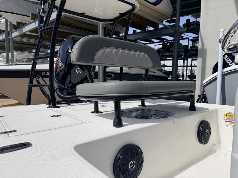 Slide: The Image of 2026 Spyder FX19 Vapor boat with gray seat and speakers. - 6