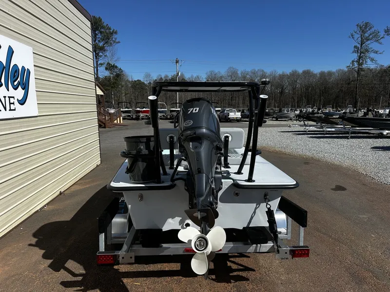 Slide: The Image of Delta Boatworks D18 CC Guide Series 2026 with outboard motor. - 3