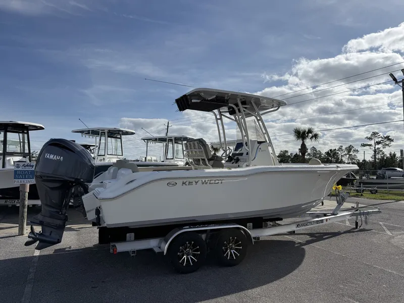 Slide: The Image of 2026 Key West 239 FS boat on trailer outdoors. - 6