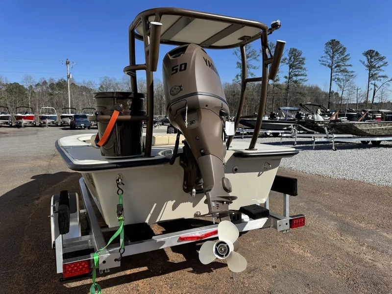 Slide: The Image of Delta Boatworks D18 T Guide Series 2026 with Yamaha engine on trailer. - 6