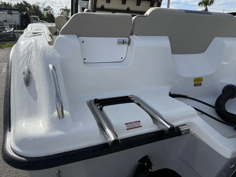 Slide: The Image of Rear view of 2026 Key West 219 FS boat with swim ladder. - 4