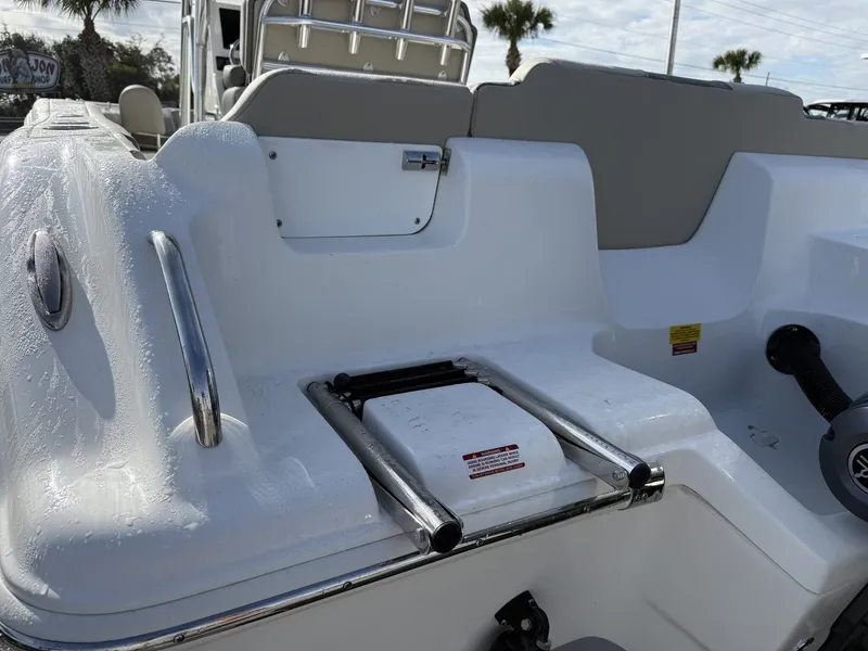 Slide: The Image of Key West 239 FS boat 2026 with ladder and seating area. - 4