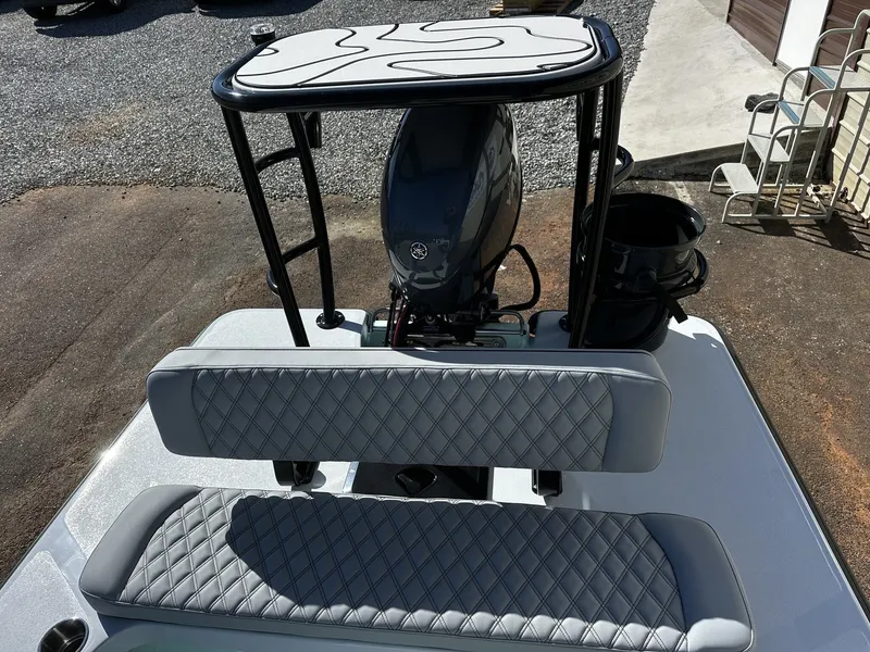 Slide: The Image of Delta Boatworks D18 CC Guide Series 2026 with grey upholstery. - 9