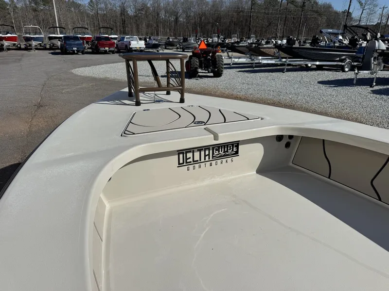 Slide: The Image of Delta Boatworks D18 T Guide Series 2026 displayed outdoors. - 3