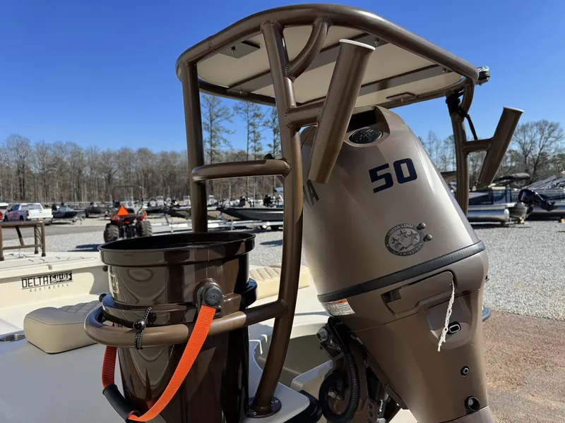 Slide: The Image of Delta Boatworks D18 T Guide Series boat with outboard motor. - 7