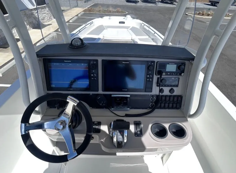 Slide: The Image of Helm console of a 2016 Boston Whaler 270 Dauntless boat. - 12