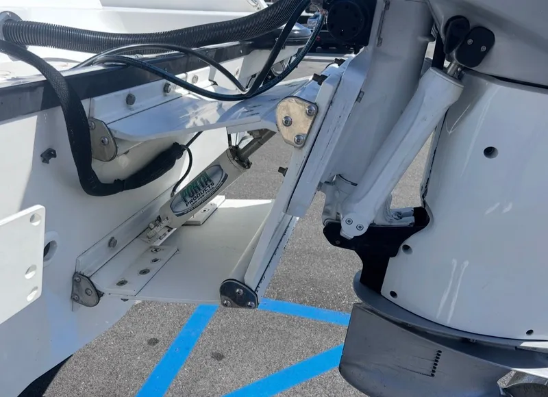 Slide: The Image of Close-up of a 2016 Boston Whaler 270 Dauntless outboard motor. - 18