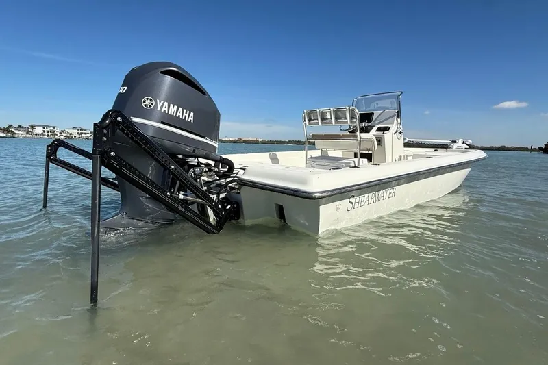Slide: The Image of 2012 ShearWater 25 LTZ boat with Yamaha engine in calm waters. - 6