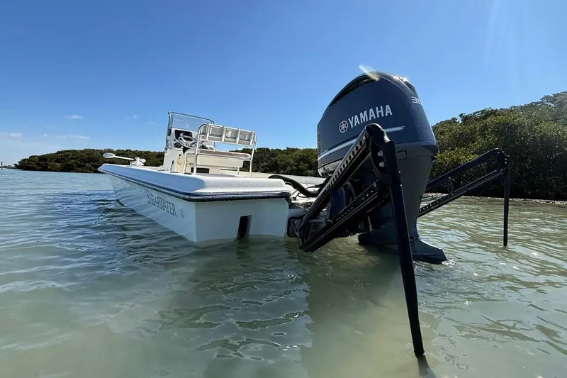 Slide: The Image of 2012 ShearWater 25 LTZ boat with Yamaha engine in shallow water. - 8