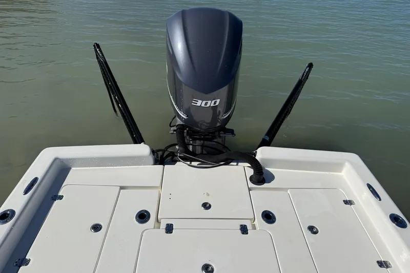 Slide: The Image of 2012 ShearWater 25 LTZ boat with powerful 300 HP engine on calm water. - 9