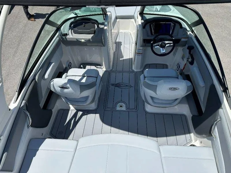 Slide: The Image of Interior of 2026 Chaparral 21 SSi with modern seating and controls. - 37