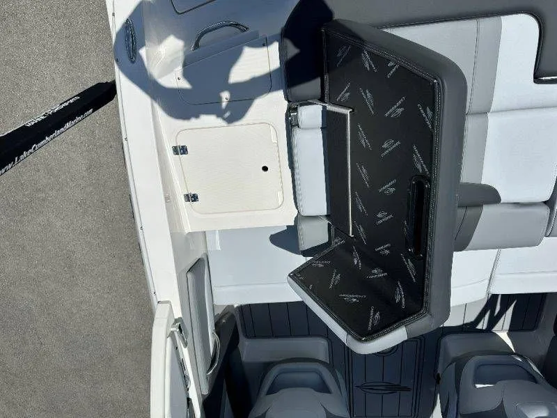 Slide: The Image of Interior of 2026 Chaparral 21 SSi with seating and storage area. - 42
