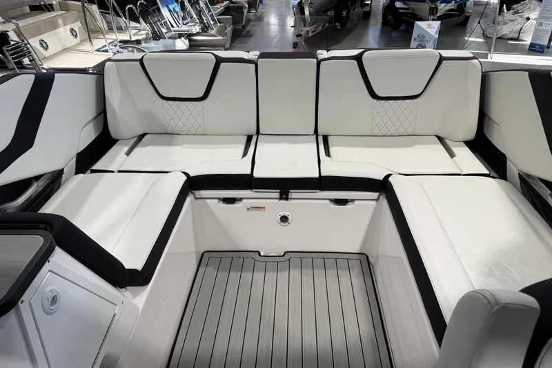 Slide: The Image of 2025 Yamaha Boats 252S interior with sleek white seating and modern design. - 3