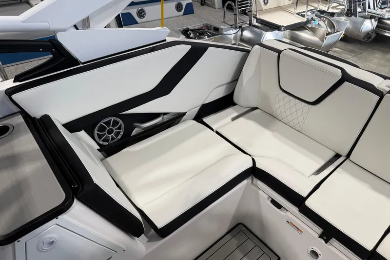 Slide: The Image of 2025 Yamaha Boats 252S interior with luxurious white seating and modern design. - 8