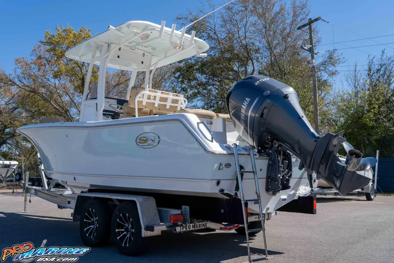 Slide: The Image of 2017 Sea Hunt Ultra 235 SE boat with Yamaha engine on trailer. - 10