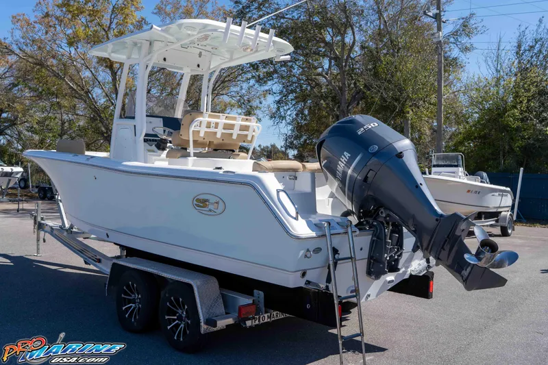 Slide: The Image of 2017 Sea Hunt Ultra 235 SE boat with Yamaha 250 engine on trailer. - 11