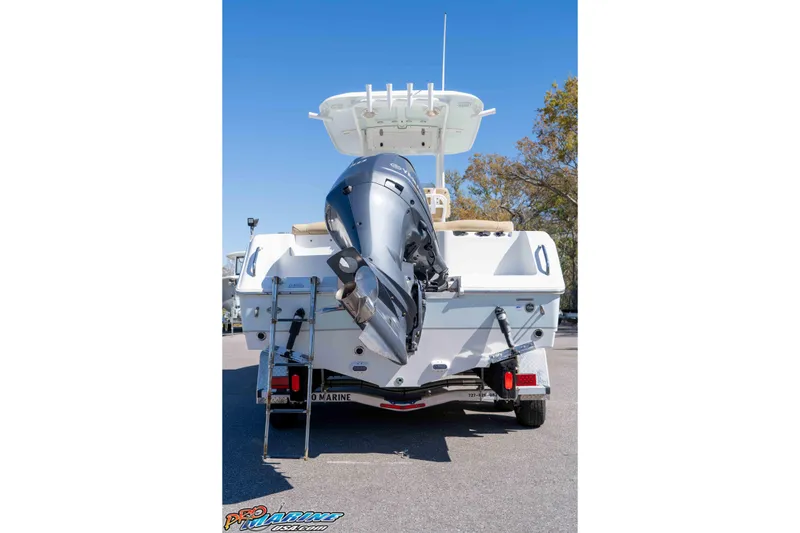 Slide: The Image of 2017 Sea Hunt Ultra 235 SE boat with outboard motor, rear view. - 12