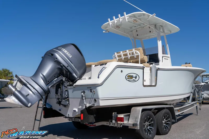 Slide: The Image of 2017 Sea Hunt Ultra 235 SE boat with Yamaha engine on trailer. - 13