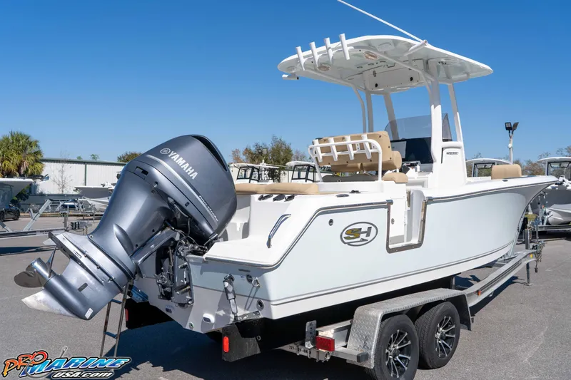 Slide: The Image of 2017 Sea Hunt Ultra 235 SE boat with Yamaha engine on trailer. - 14