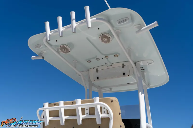 Slide: The Image of 2017 Sea Hunt Ultra 235 SE boat top view against clear blue sky. - 17