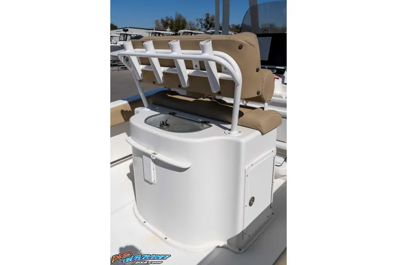 Slide: The Image of 2017 Sea Hunt Ultra 235 SE boat interior with rod holders and seating. - 22