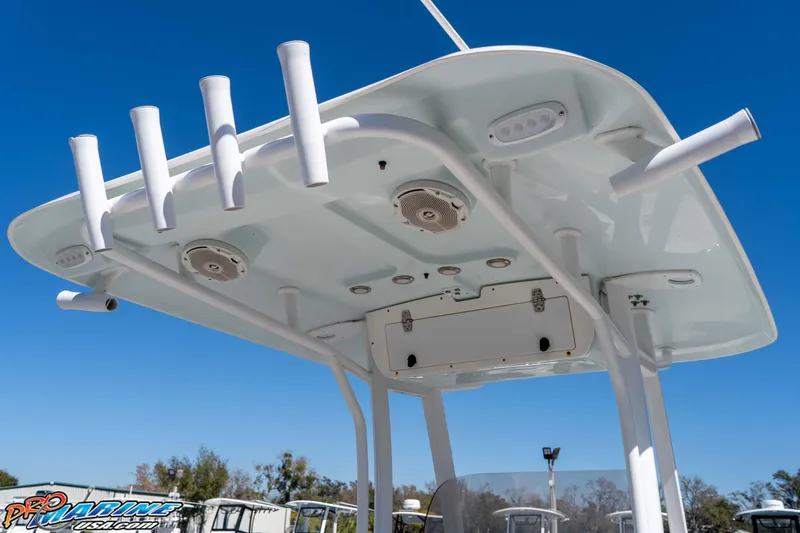 Slide: The Image of T-top of 2017 Sea Hunt Ultra 235 SE boat with rod holders and speakers. - 23