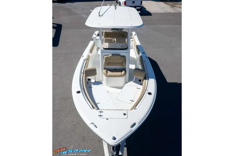 Slide: The Image of 2017 Sea Hunt Ultra 235 SE boat with spacious seating and sleek design. - 39
