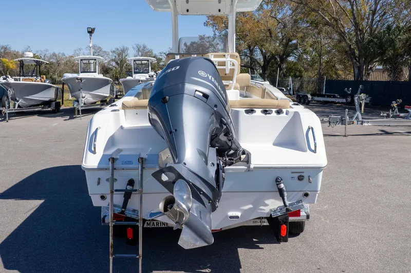 Slide: The Image of 2017 Sea Hunt Ultra 235 SE boat with Yamaha outboard motor, parked outdoors. - 50